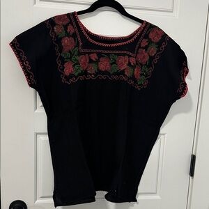 Embroidered Black Top with Red and Green Accents